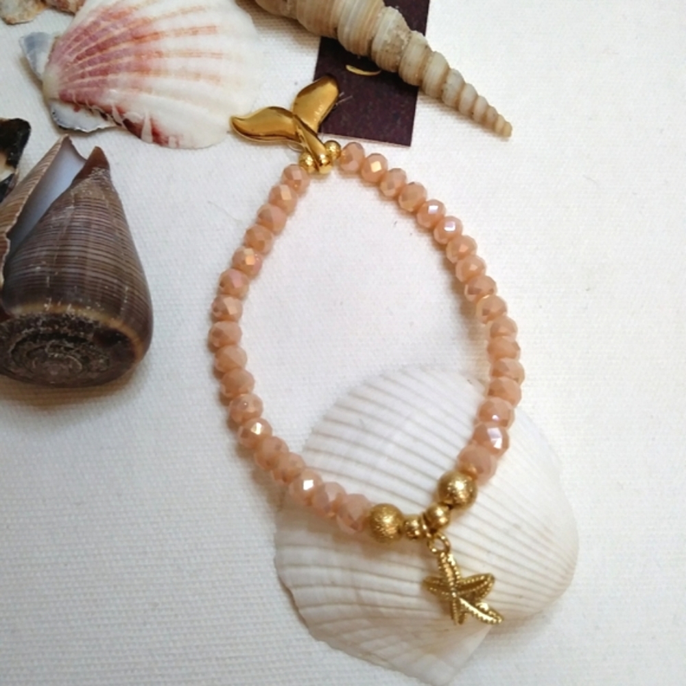 Mermaid tail charm bracelet. Woman beaded bracelet whale tail charm. Sea star